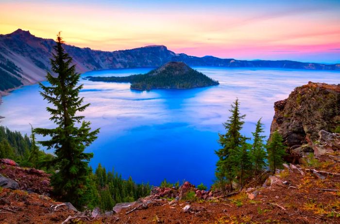 Crater Lake National Park in Oregon, showcasing Wizard Island in the background.