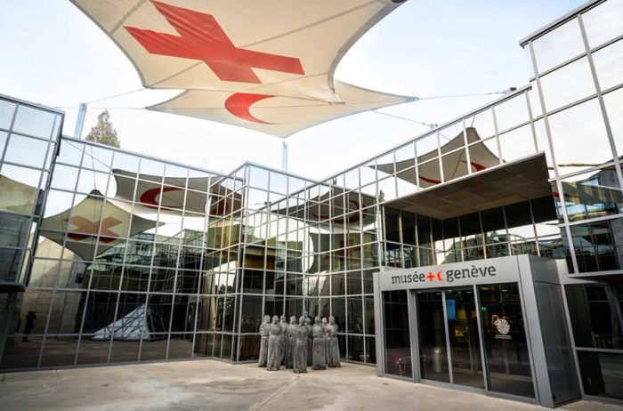 Entrance to the International Museum of the Red Cross and Red Crescent in Geneva, Switzerland, featuring its logo