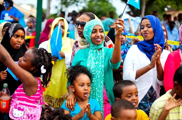 Individuals celebrating Somali Independence Day in Minneapolis, Minnesota.