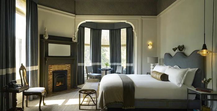 Each guestroom boasts unique design elements, such as an original fireplace or a charming bay window.