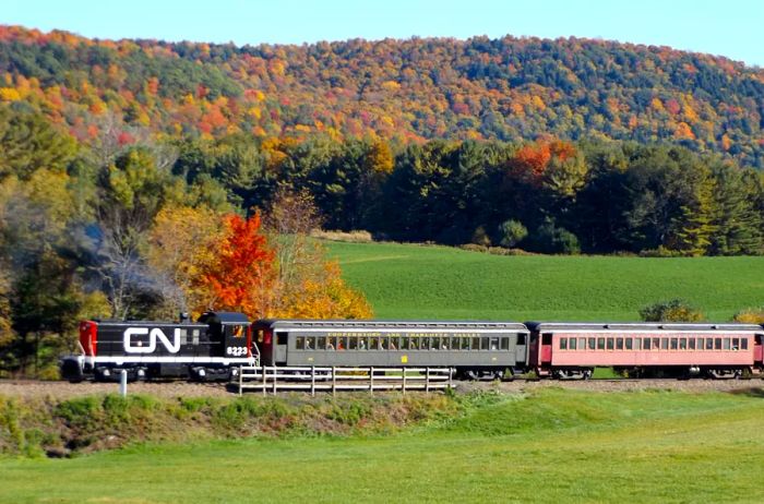 The Cooperstown and Charlotte Valley Railroad travels through the picturesque Susquehanna River Valley adorned in fall colors