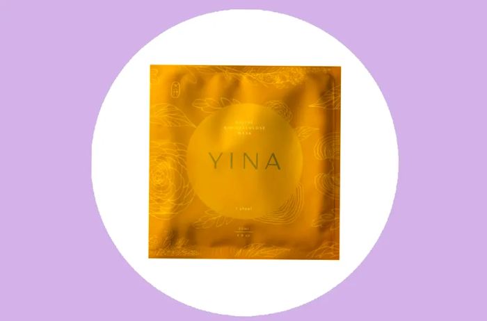 A golden Yina sheet mask in a square package