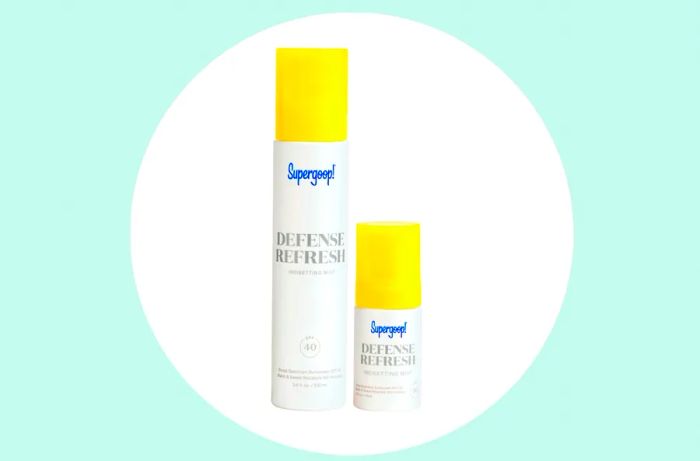 A large and a small container of Supergoop sunscreen