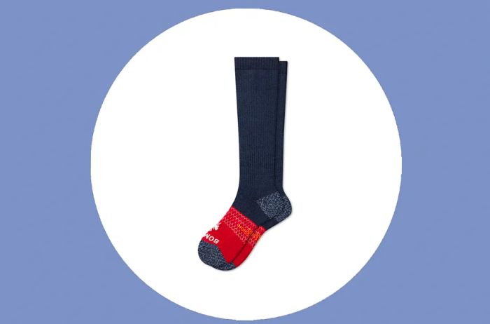 A pair of navy men’s Bombas compression socks