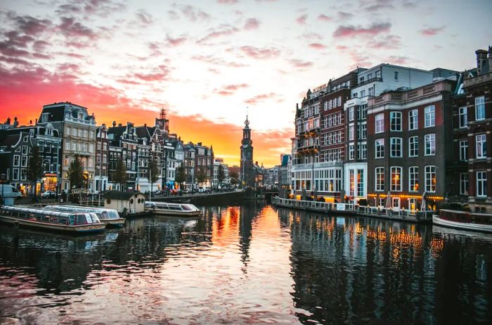 Sunset over the canals and buildings of Amsterdam