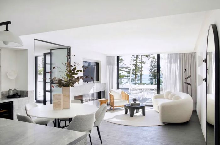 The Infinity Residence at Manly Pacific features a palette of white and neutral-toned furnishings.