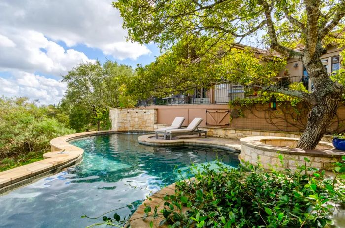 Curvy pool nestled among trees