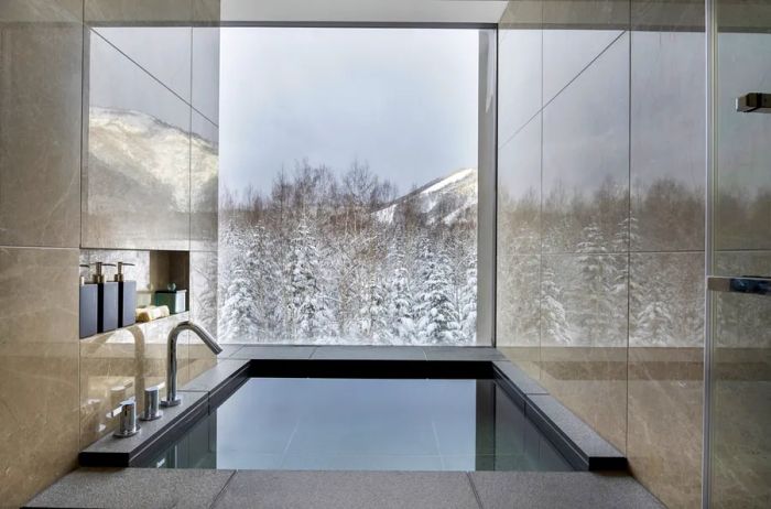 An ofuro bathtub in a suite at Higashiyama Niseko Village, a Ritz-Carlton Reserve.