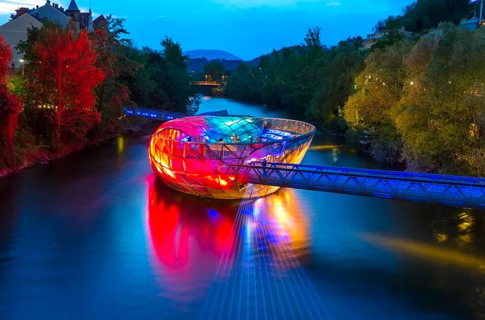 One of Graz’s architectural wonders is the Murinsel, a unique floating island made of glass panels.