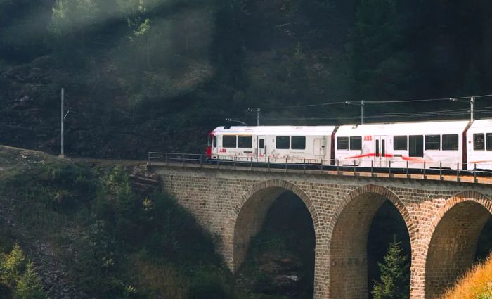 The Glacier Express train journeys over the majestic mountains of Switzerland.