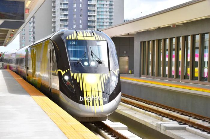 Front view of a Brightline train at the station