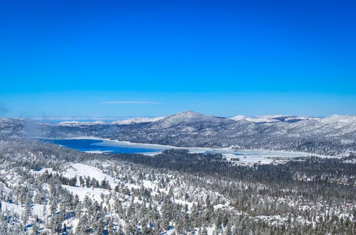 Big Bear Lake nestled among snow-covered hills and mountains