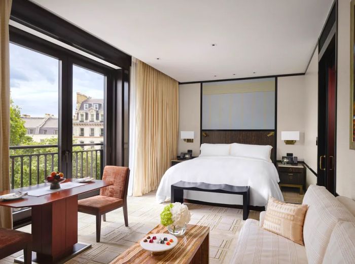 The Premier Room King at Peninsula London boasts floor-to-ceiling windows and generous seating areas.