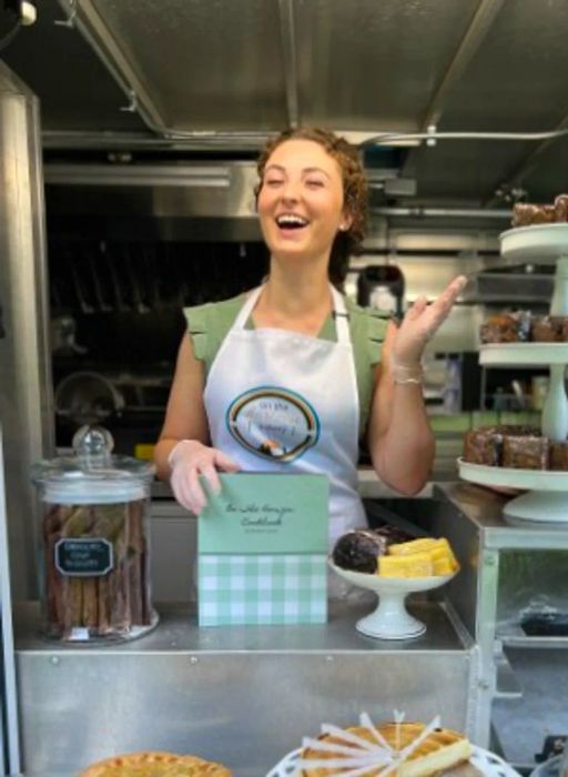 Baker Hailee Carter beaming in her On The Horizon food truck in Ellsworth, Maine