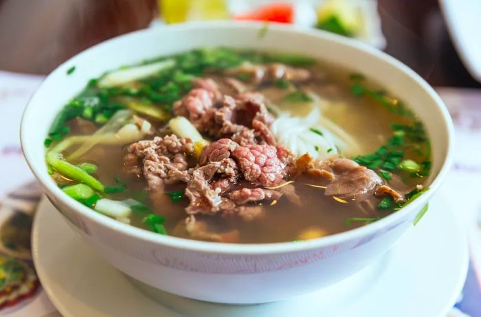 Pho is thought to have emerged in Vietnam during the French Colonial period, evolving from the traditional pot-au-feu.