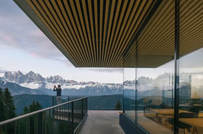 The Anders Mountain Retreat in Italy overlooks the lush fir forests and majestic mountains of the Dolomites.