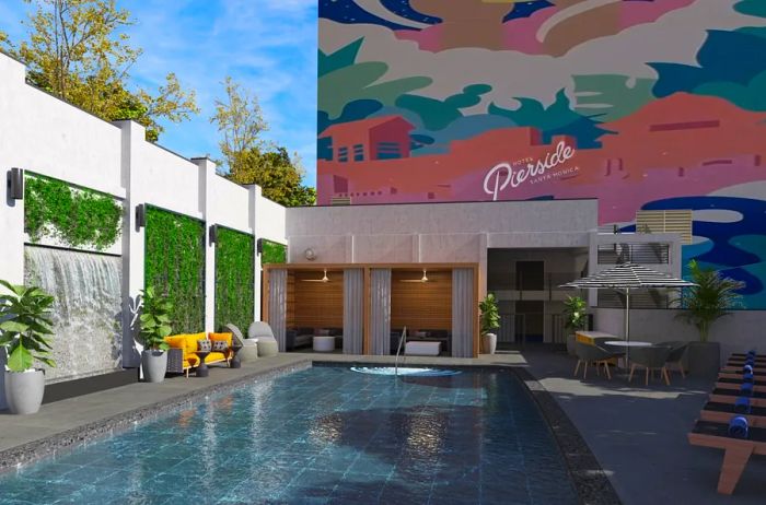 Hotel Pierside features a pool adorned with contemporary decor, lush plant walls, and a vibrant mural