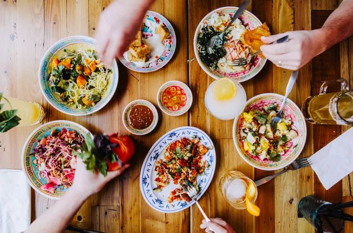 Aerial view of a variety of dishes at the Southeast Asian restaurant Hai Hai in Minneapolis