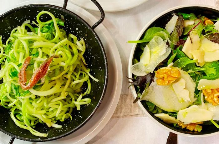 Puntarelle, also known as chicory shoots, beautifully plated in a restaurant.