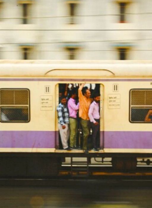 Crowds boarding a train in Mumbai, India.