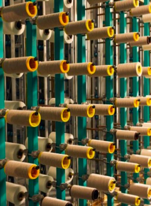 Skeins of wool neatly arranged on racks at Gobi Cashmere.