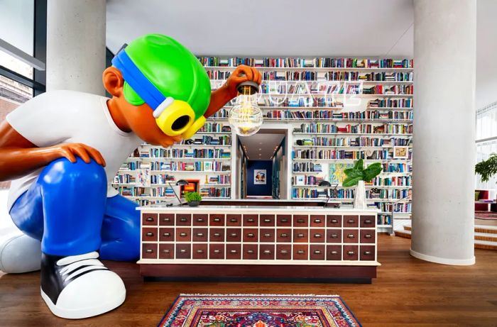 Hebru Brantley’s Flyboy welcomes guests at the lobby of Graduate Roosevelt Island.