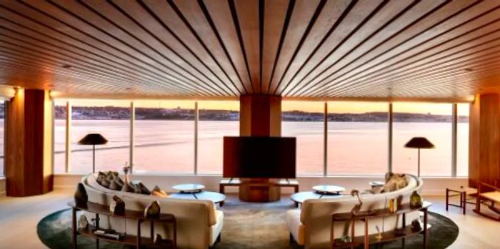 The Watch suite boasts three walls that provide stunning views of Halifax Harbor, along with a private tasting room for local wines and spirits.