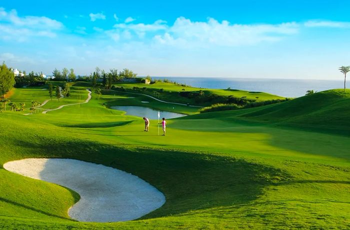 Play a round of golf in Bermuda.