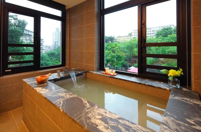 A view of Beitou’s greenery and skyline from a private room at the Grand View Hotel