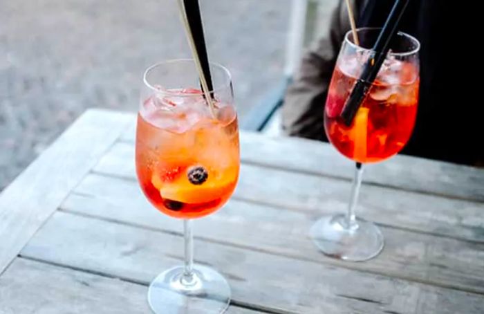 Enjoy an Aperol Spritz while cruising to Italy