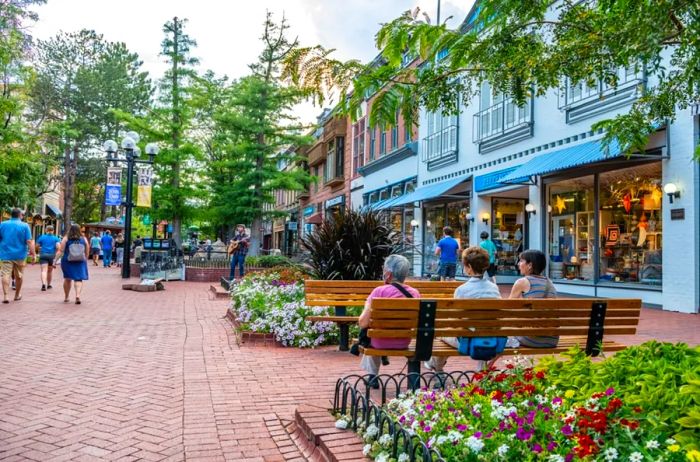 Visitors strolling along Pearl Street Mall