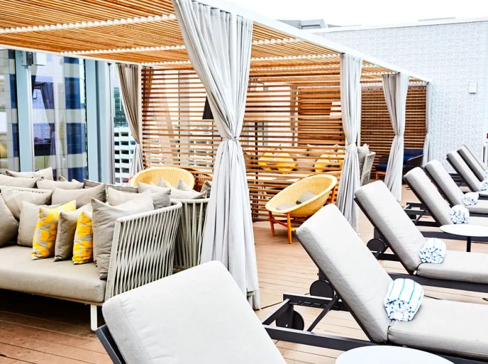 The poolside seating area at the Intercontinental Los Angeles.