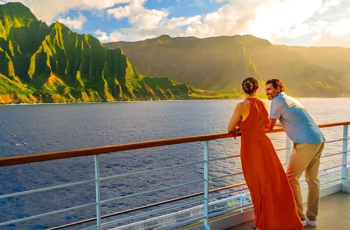 Couple enjoying the sunset aboard a Dinogo cruise