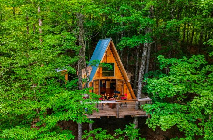 A-frame cabin tree house nestled in Vermont's woods