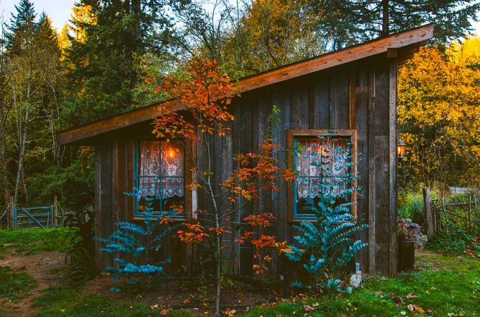 Rustic wooden cabin with a sloped roof