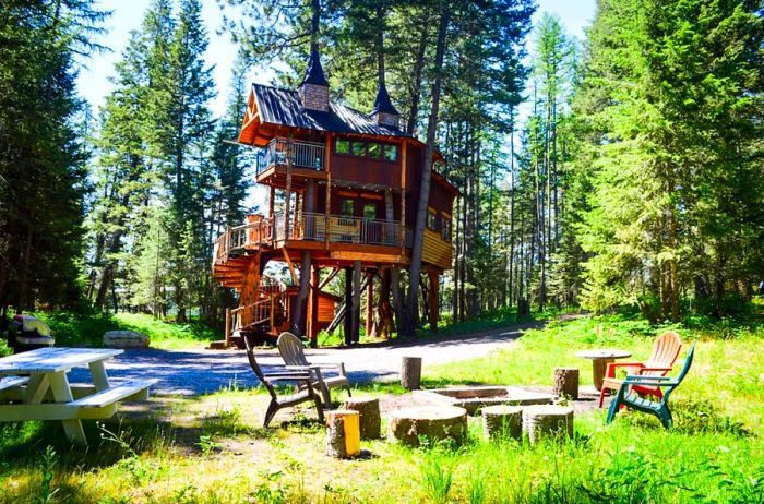 Spacious two-story tree house cabin nestled in the Montana woods