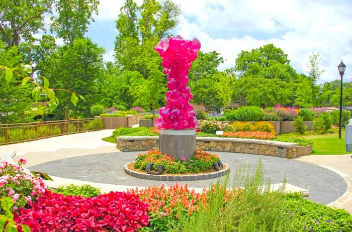 <i>Notable public art in Greenville features Dale Chihuly’s stunning Rose Crystal Tower.</i>