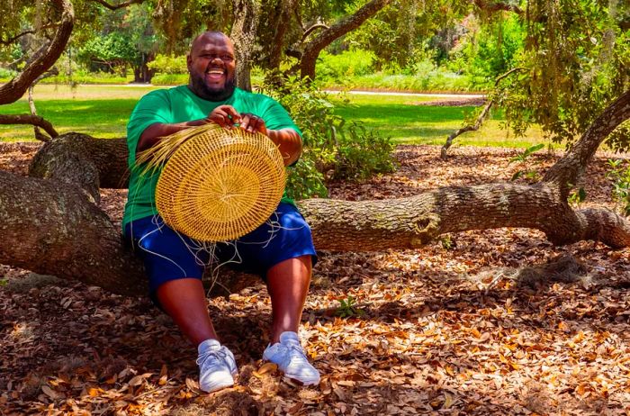 Corey Alston is a fifth-generation weaver of sweetgrass baskets.