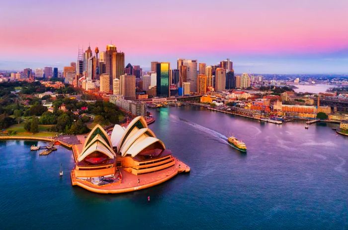 Sunrise above the Sydney Opera House and its picturesque harbor