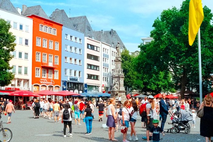 A bustling town square in Cologne, Germany