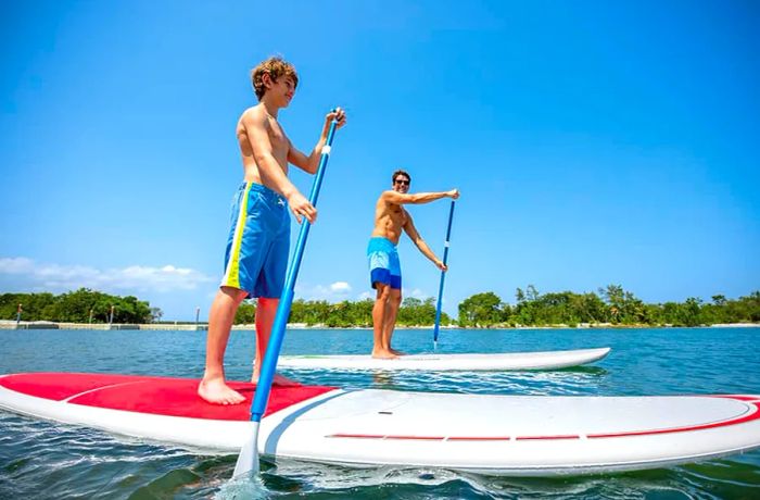 Paddleboarding at Harvest Caye