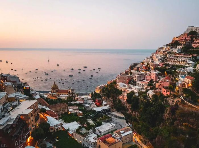 Embark on a journey to Italy’s Amalfi Coast, where the charming labyrinth of Positano’s streets beckons for discovery.