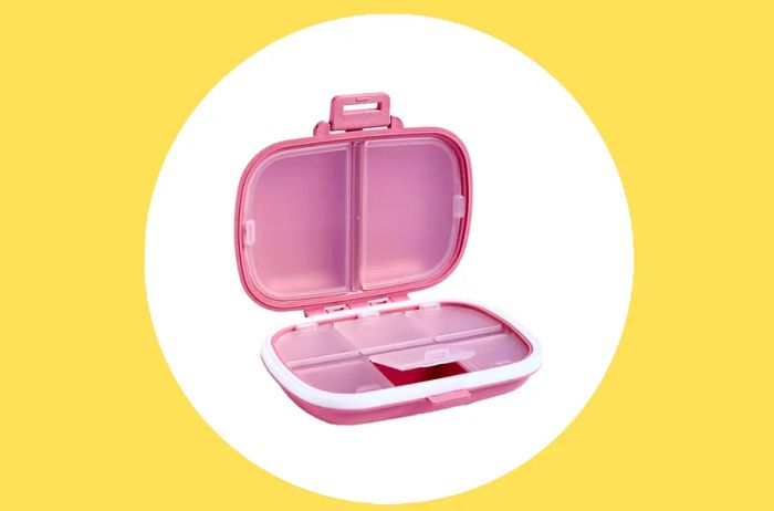 Pink portable pill organizer