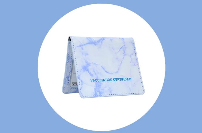 This faux leather vaccine card holder allows you to display your CDC card and ID simultaneously.