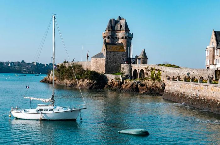 White sailboat near the coast in Brittany