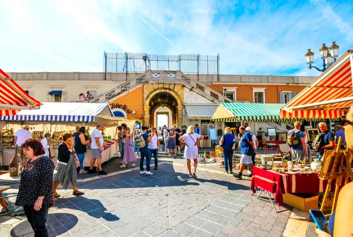 Market-goers at the Cours Saleya outdoor market in Vieux Nice