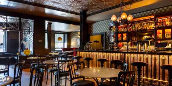 The National Bar hosts live events, including belly dancing and Drag Queen Bingo.
