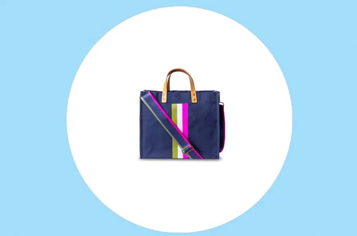 Navy blue Tote-Ally tote bag featuring vertical stripes in green, white, and purple