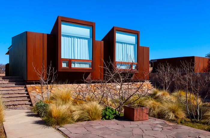 Rooms at Tierra Atacama feature aged metal exteriors.