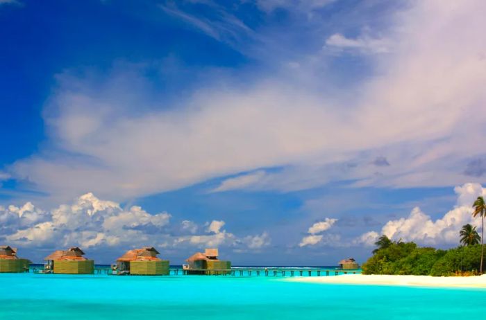 A selection of overwater bungalows at Six Senses Laamu